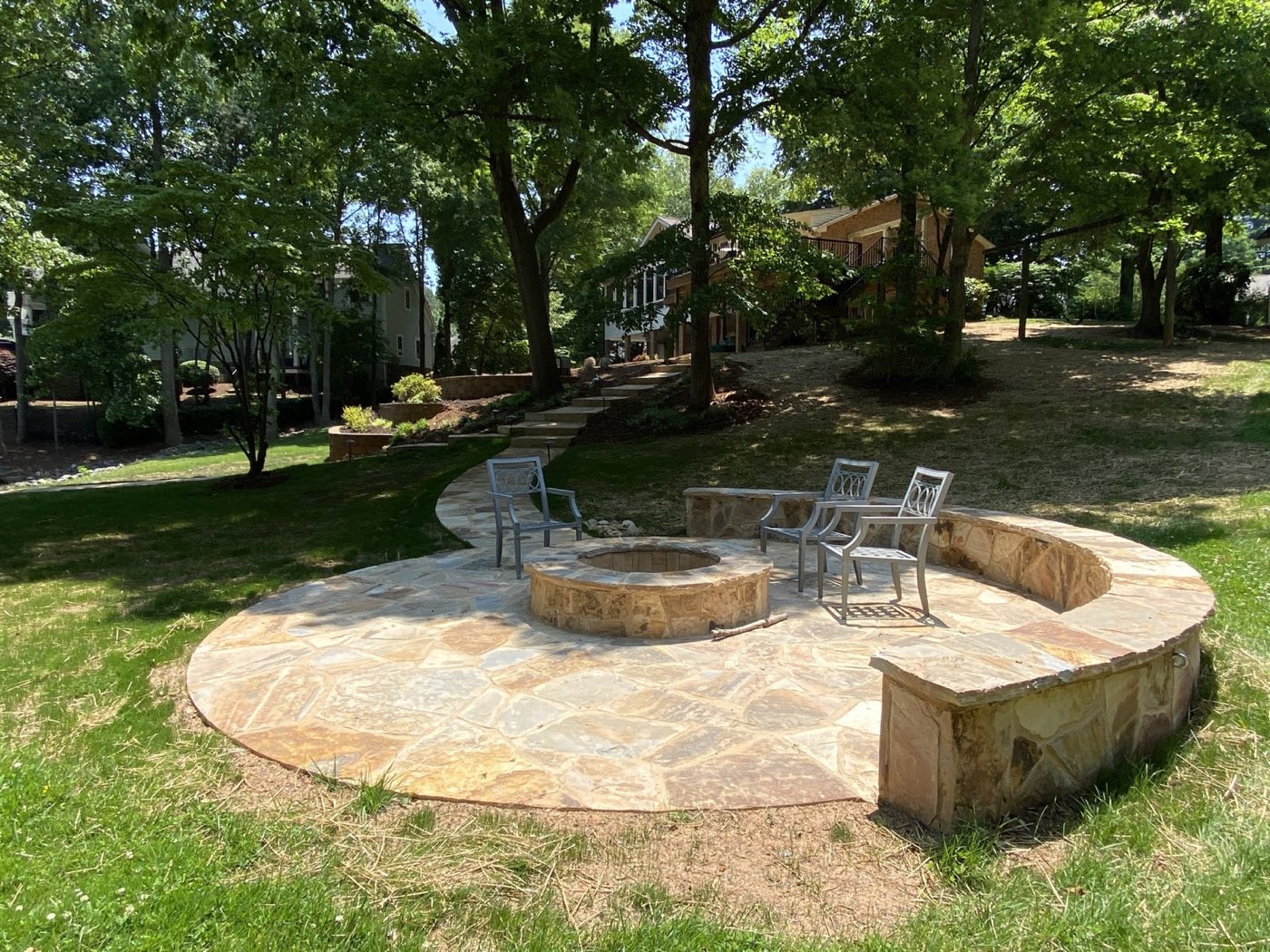 Flagstone fire pit terrace with seating