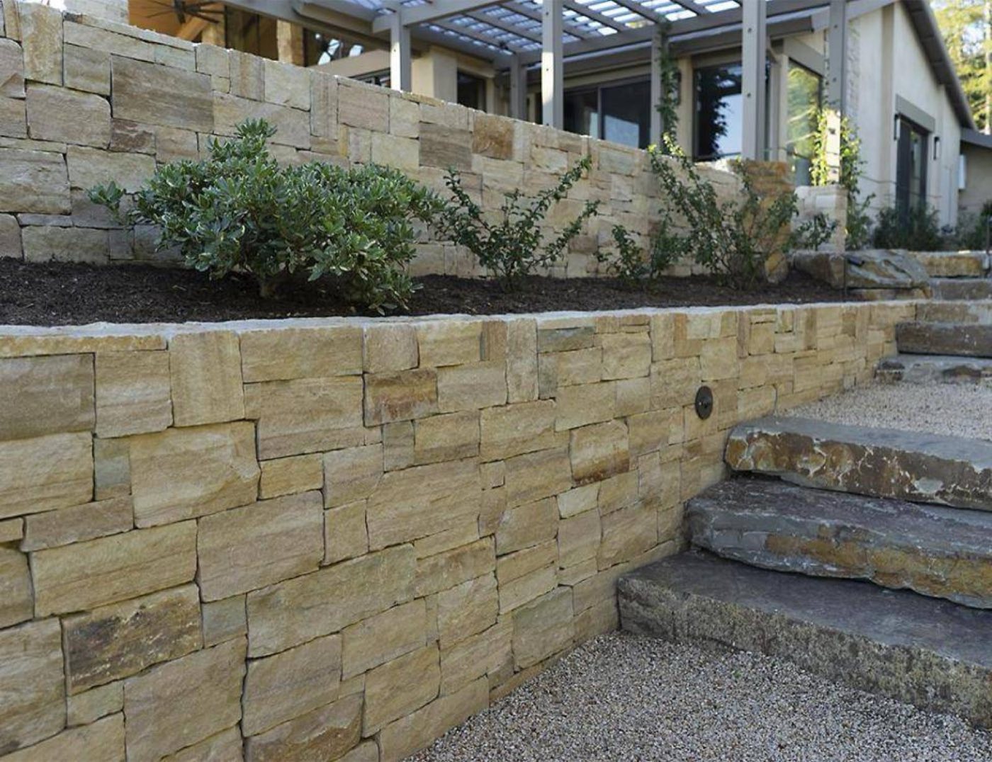 Natural stone wall built by Carolina Custom Stone and Hardscape