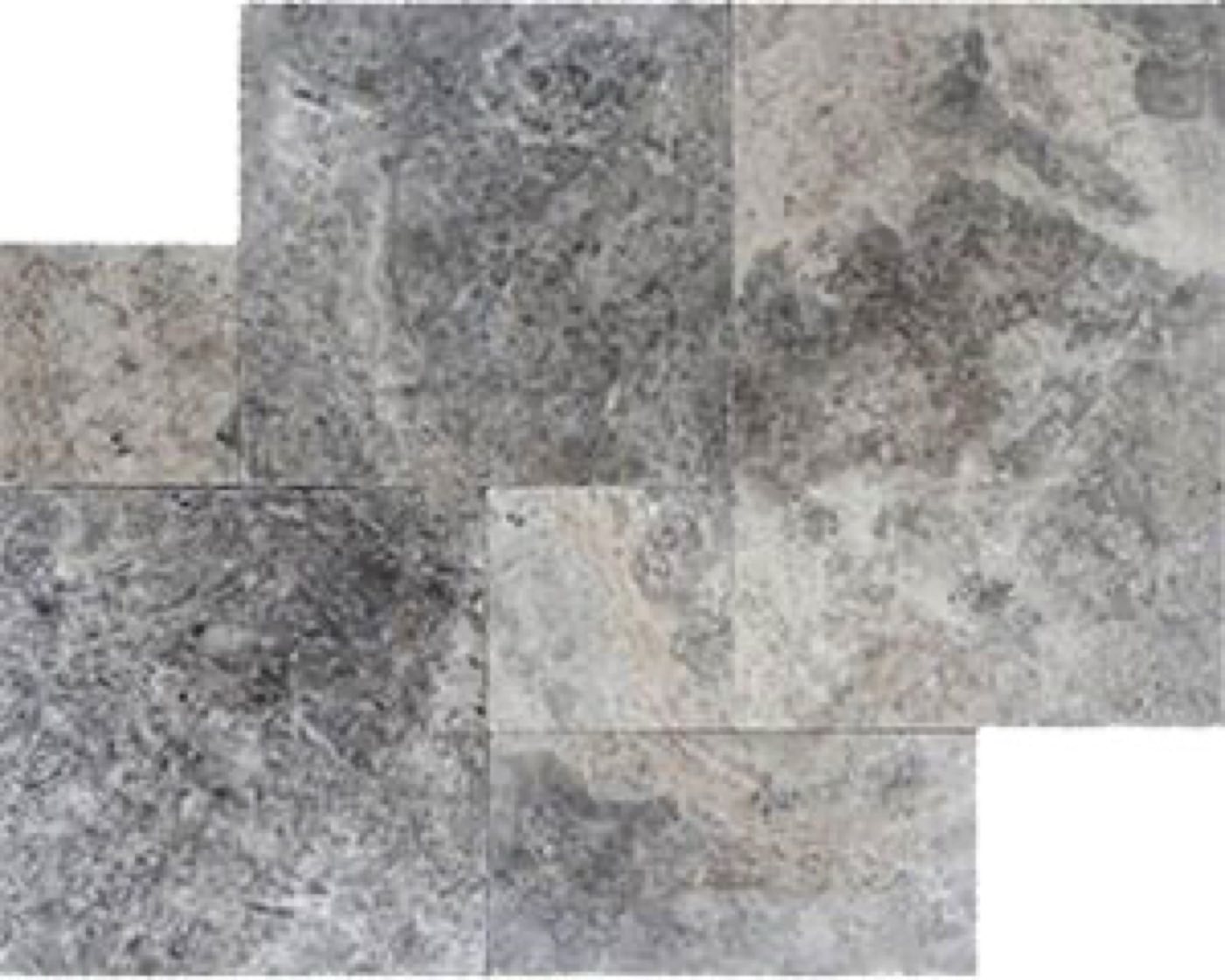 Travertine pavers in a French pattern, silver-grey with dark mottling